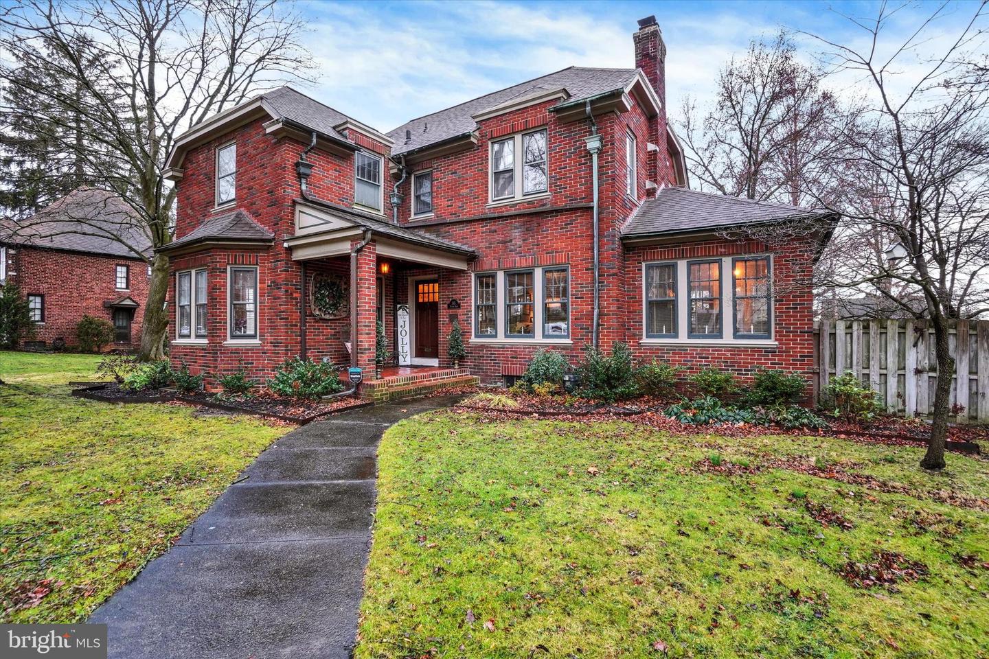 185 Peyton Road from the sidewalk showing full facade, bay window, and covered porch
